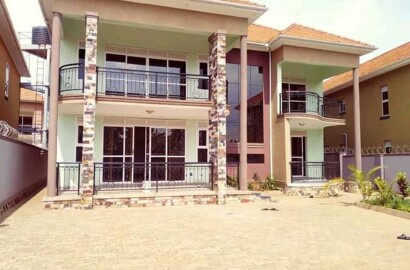 BRAND NEW FOUR BED ROOM FLAT HOUSE SEATED ON 50X100FT IN KIRA AT 900M.